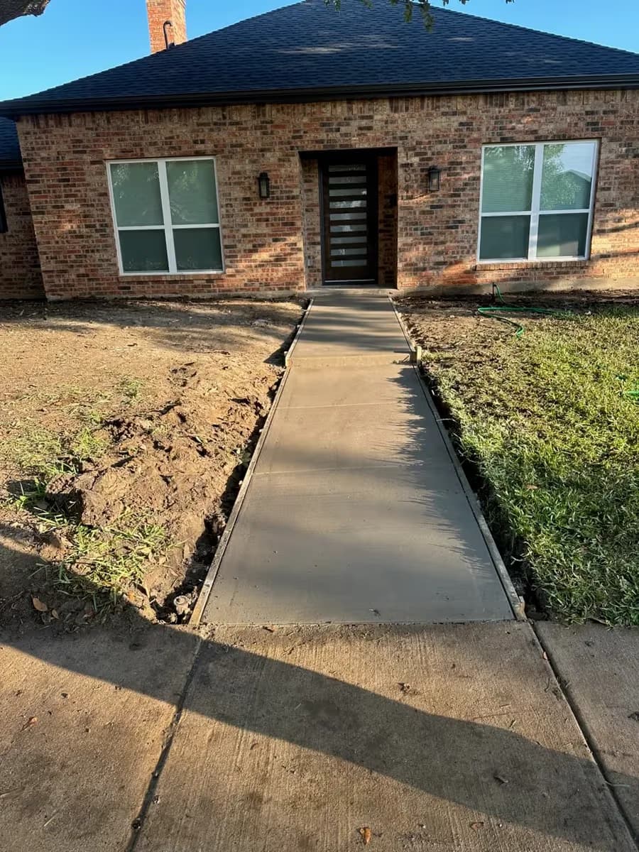 Residential concrete sidewalk installation finished by Espinoza Chavez Construction in the Dallas-Fort Worth area